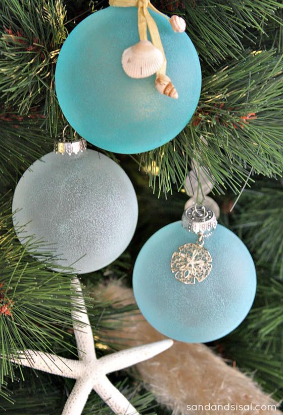 ivory white christmas balls on the other hand look like giant pearls nestled between the branches this palette of white and turquoise aqua and sky blue - White Christmas Tree With Blue Decorations ivory white christmas balls on the other hand look like giant pearls nestled between the branches this palette of white and turquoise aqua and sky blue - White Christmas Tree With Blue Decorations