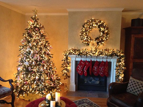 Her prelit California Baby Redwood™ Christmas tree glistens when the luminescence of the clear lights is cast on the gold decorations yet softened by the ...
