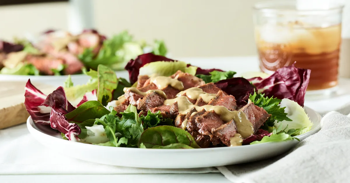 Smoked Strip Steaks with Blue Cheese-Wine Sauce | Beef Loving Texans | Beef Loving Texans is your one-stop information center for beef recipes, cooking techniques and real life stories. Lean more about beef today. Brought to you by the Texas Beef Council.