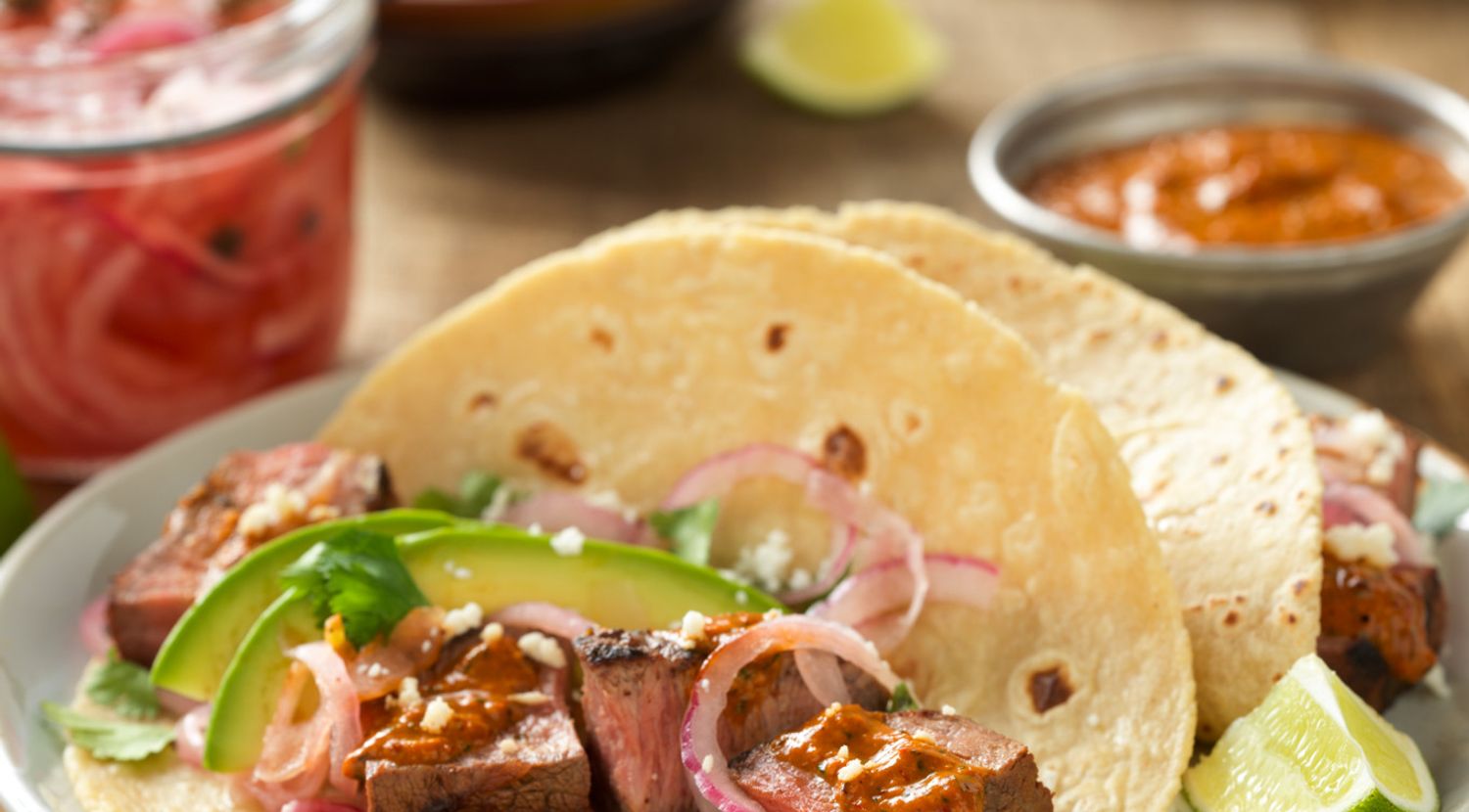 Grilled Adobo Beef Steak Tacos with Creamy Chipotle Salsa and Tequila Pickled Red Onions