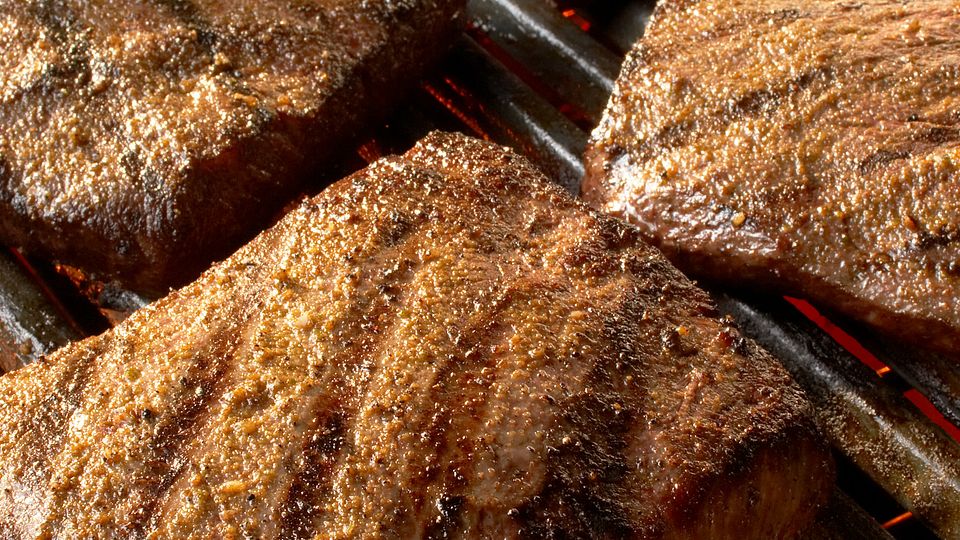 Flat Iron Steaks with Grilled Corn and Cumin-Lime Butter
