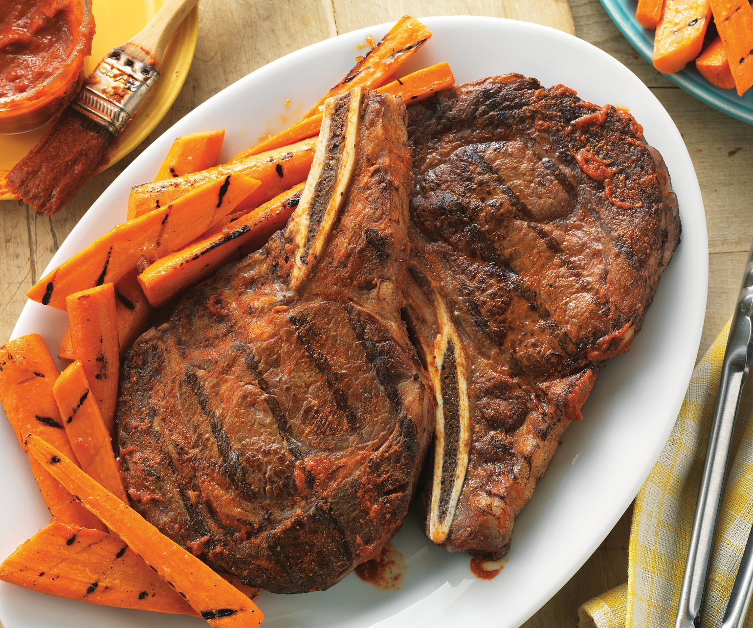 Spicy Ribeye Steaks with Ginger-Orange Grilled Carrots