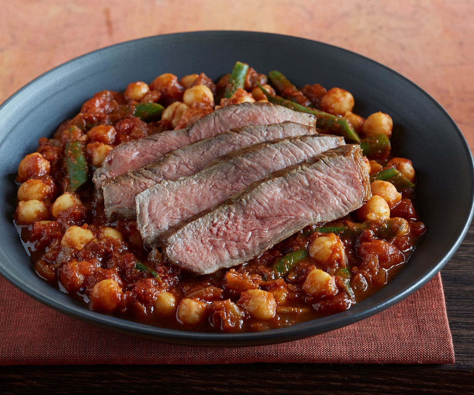 Grilled Strip Steak with Moroccan Stew