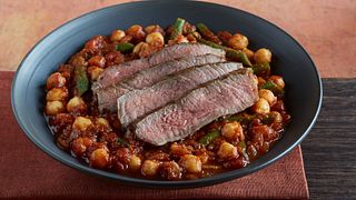 Grilled Strip Steak with Moroccan Stew