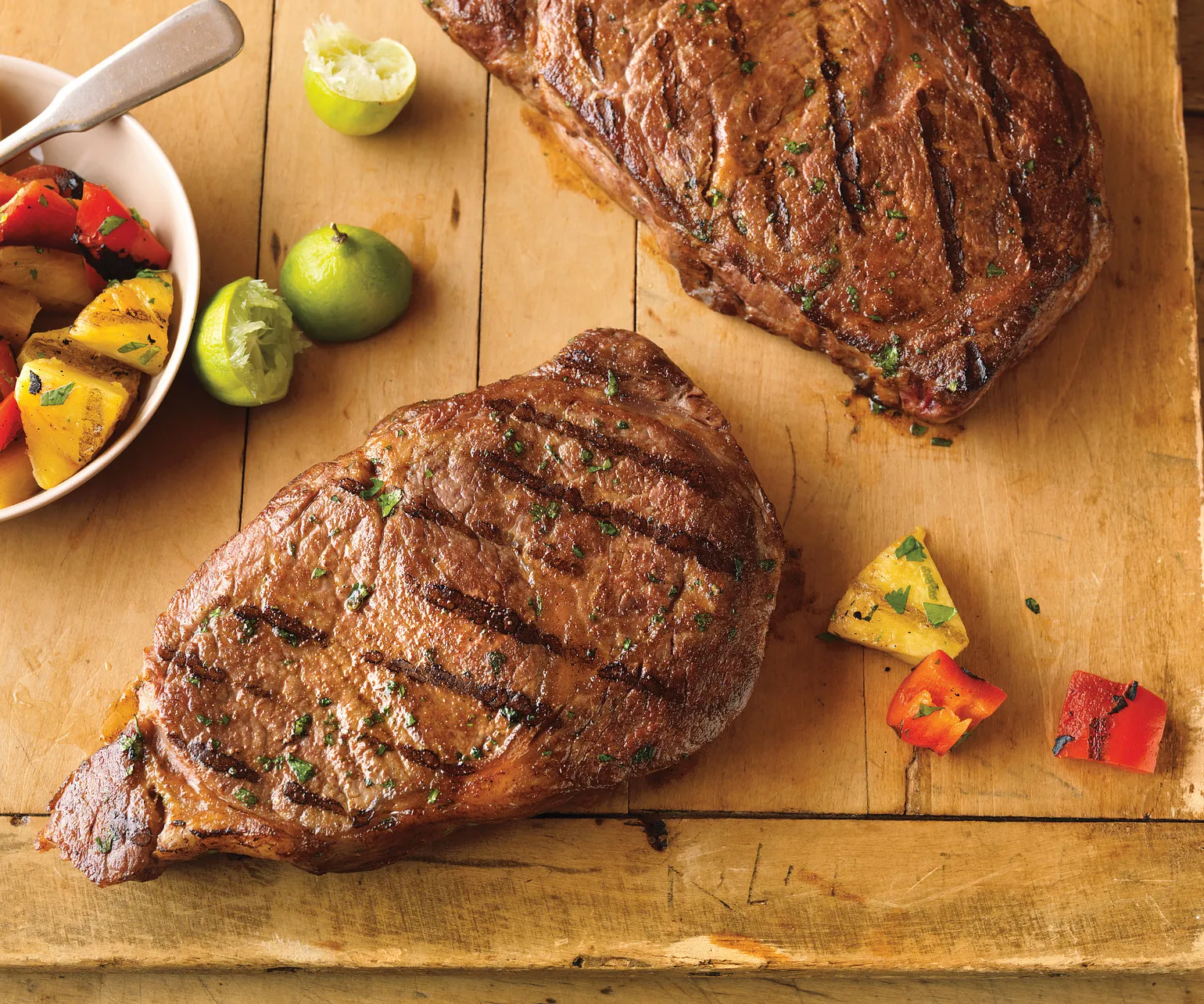 Hawaiian Ribeye Steaks with Grilled Pineapple Salad