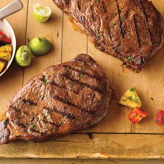 Caribbean Ribeye Steaks with Grilled Pineapple Salad