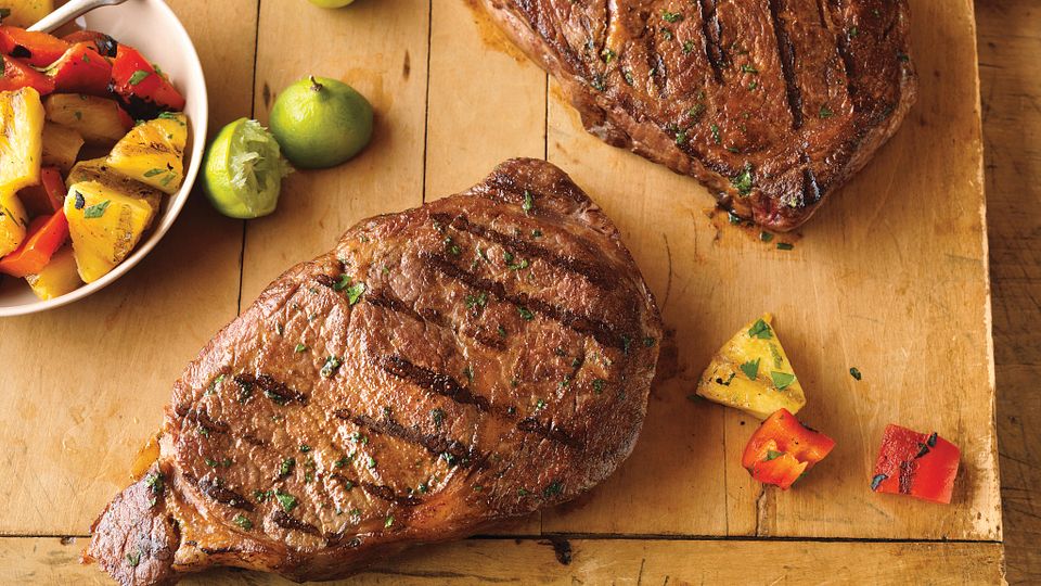Hawaiian Ribeye Steaks with Grilled Pineapple Salad