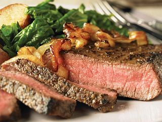 Peppered Steaks with Caramelized Onions