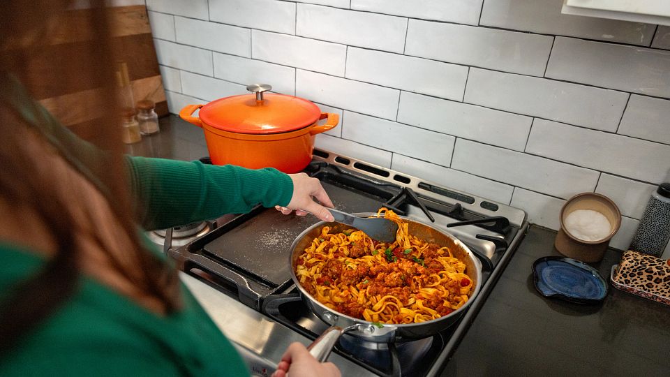 Ragu In Pan with Tongs_BDIA