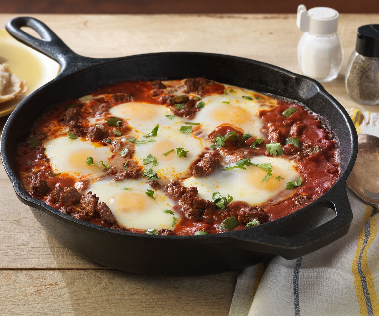 Saucy Beef with Baked Eggs