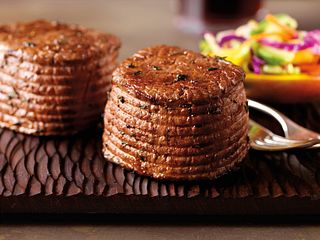 Pepper-Ancho Rubbed Ribeye Filets with Mango Slaw