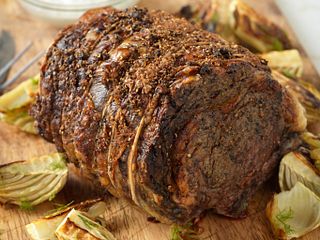 Herb-Crusted Beef Rib Roast with Roasted Fennel and Horseradish Cream Sauce