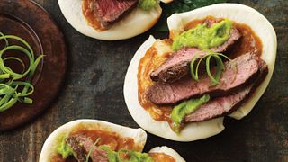 Seems like Chinese-style bao buns are the hottest news in hand-held.  And nothing puts “wow” on a bao like thin slices of grilled five-spice-seasoned Flat Iron steak with creamy hoisin peanut sauce and scallion oil.  Looking to serve a small plate that makes a big statement?  Slice up some steak and bao down.