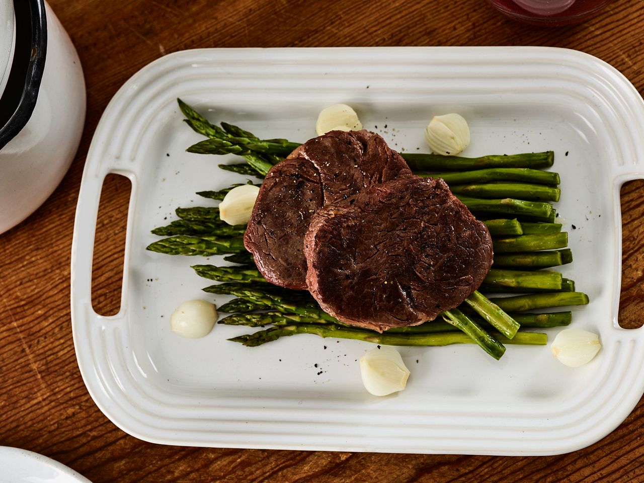 Sous Vide Tenderloin Steaks with Asparagus and Onions
