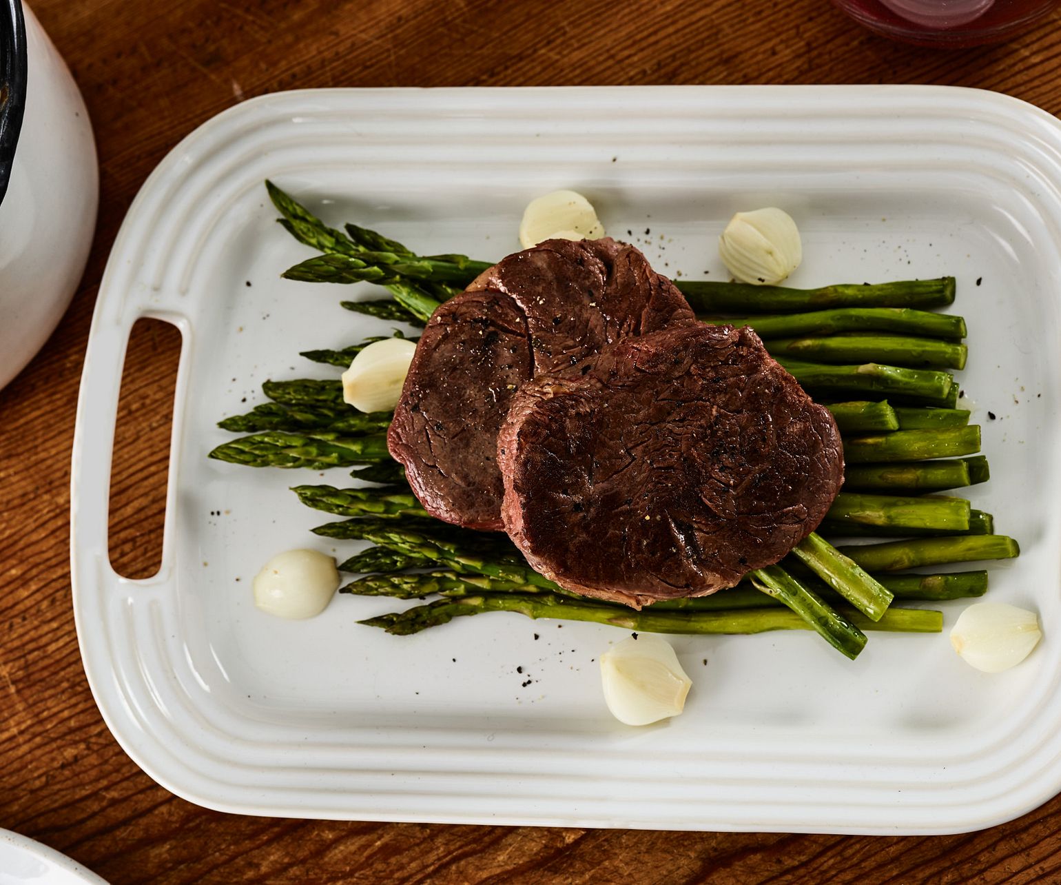 Sous Vide Tenderloin Steaks with Asparagus and Onions