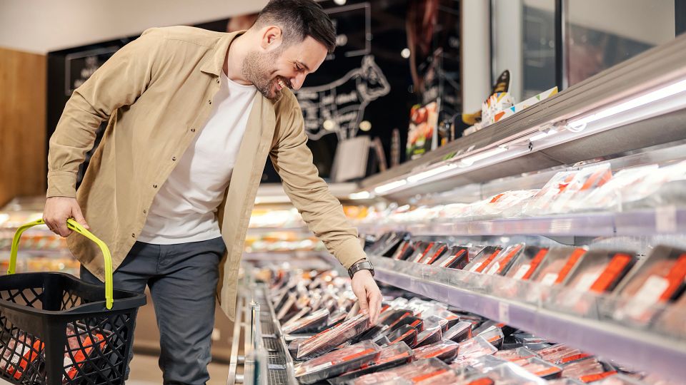 Retail Consumer Adding Beef to Cart