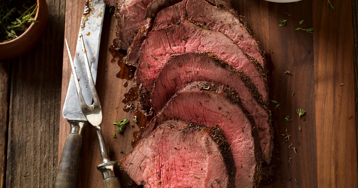 Thyme-Rubbed Beef Sirloin Tip Roast with Roasted Onion and Pear Wild Rice | Beef Loving Texans | Bee