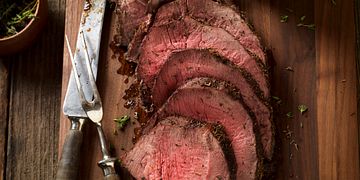 Thyme-Rubbed Beef Round Tip with Roasted Onion and Pear Wild Rice Horizontal