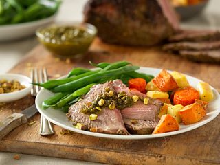 Herb-Crusted Beef Roast with Pistachio-Leek Pesto