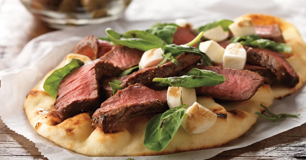 Grilled Steak and Fresh Mozzarella Flatbread | Beef Loving Texans | Beef Loving Texans is your one-stop information center for beef recipes, cooking techniques and real life stories. Lean more about beef today. Brought to you by the Texas Beef Council.