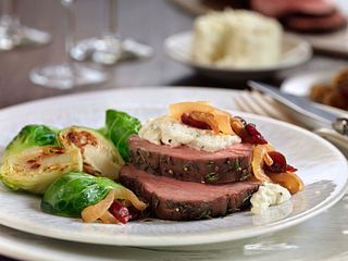 Tenderloin Roast with Wine-Braised Onions and Herb Cheese