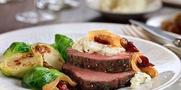 Tenderloin Roast with Wine-Braised Onions and Herb Cheese