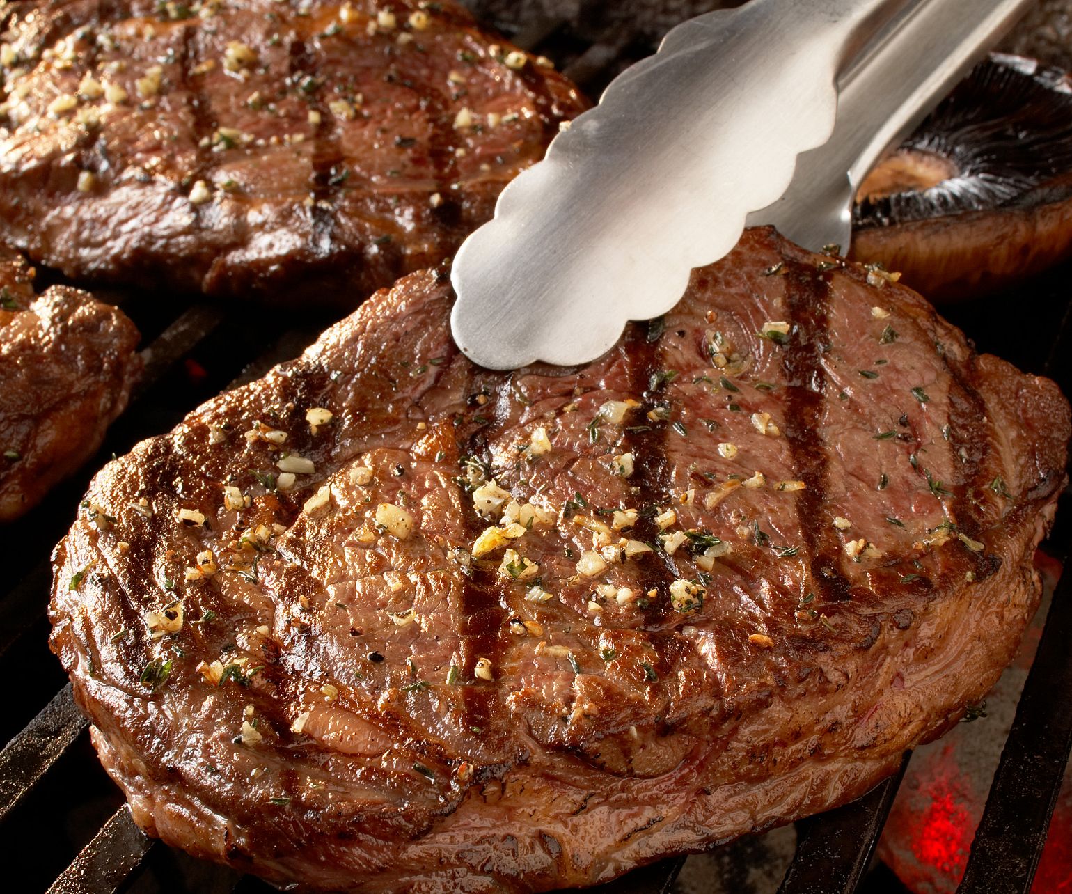 Ribeye Steaks with Blue Cheese Butter and Mushrooms