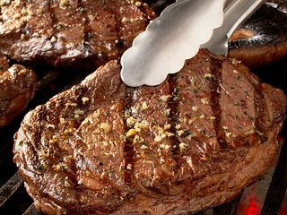 Ribeye Steaks with Blue Cheese Butter and Mushrooms