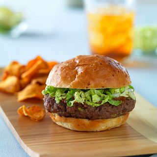 This unique burger is topped with the flavors of Thailand: peanut butter, lime juice and hoisin with the crunch of cabbage.