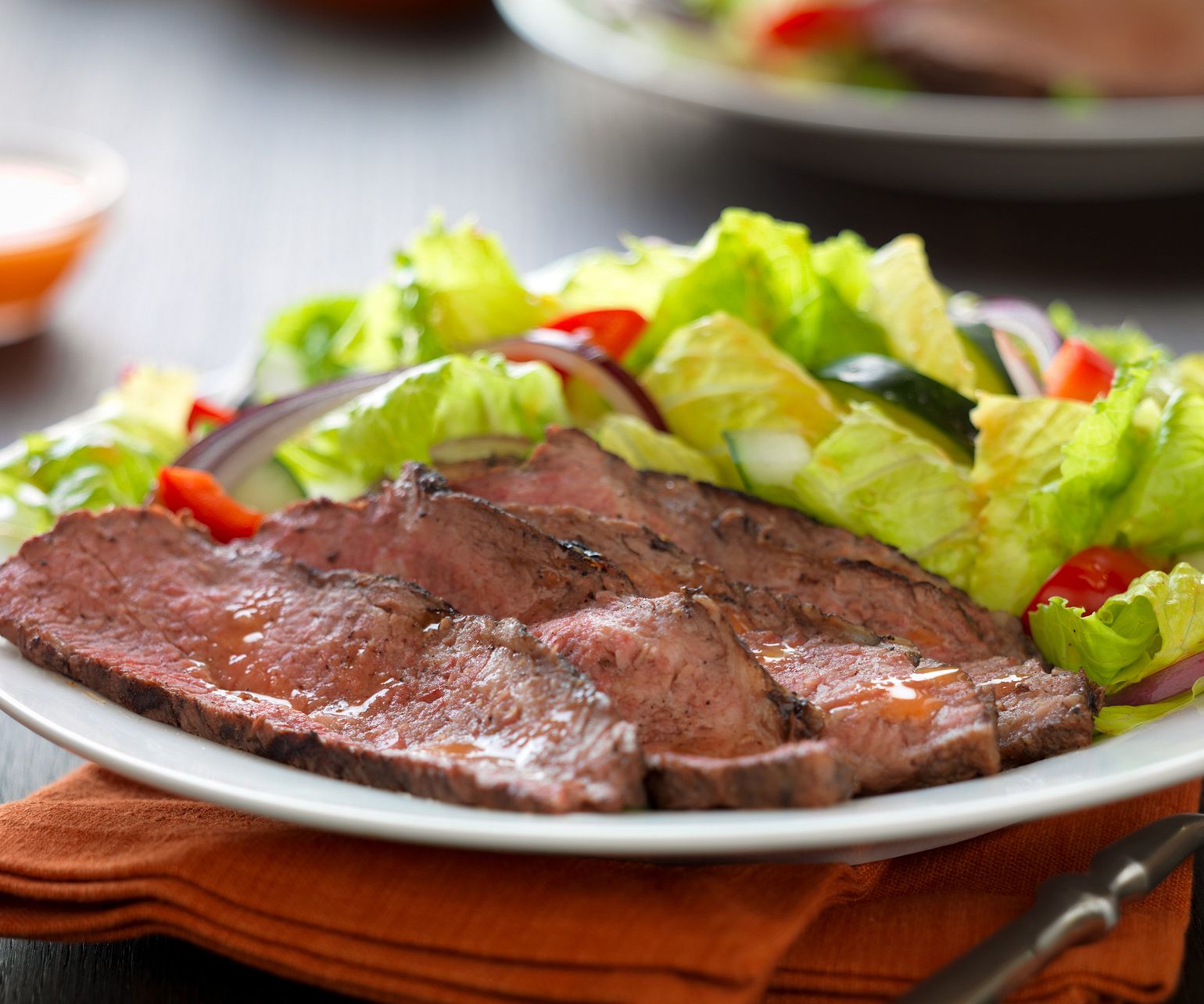 Caribbean Jerk Tri-Tip Over Basil Lime Salad