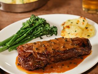 New York Strip Steaks with Peppercorn Sauce