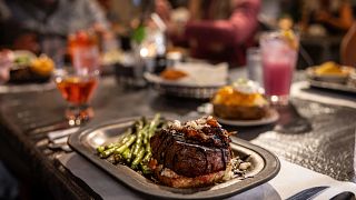 steak with toasted bread and asparagus
