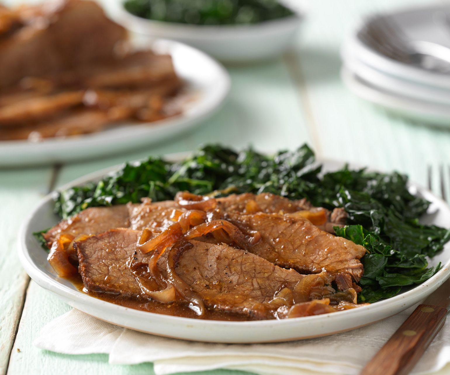 Pomegranate-Braised Beef Brisket with Caramelized Onions