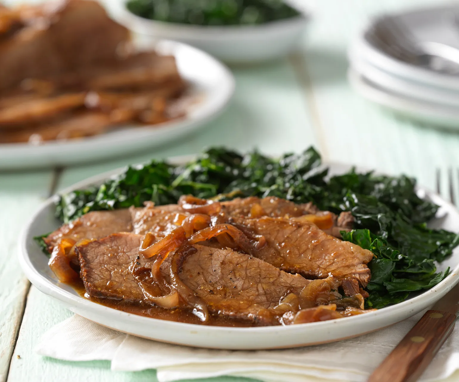 Pomegranate-Braised Beef Brisket with Caramelized Onions