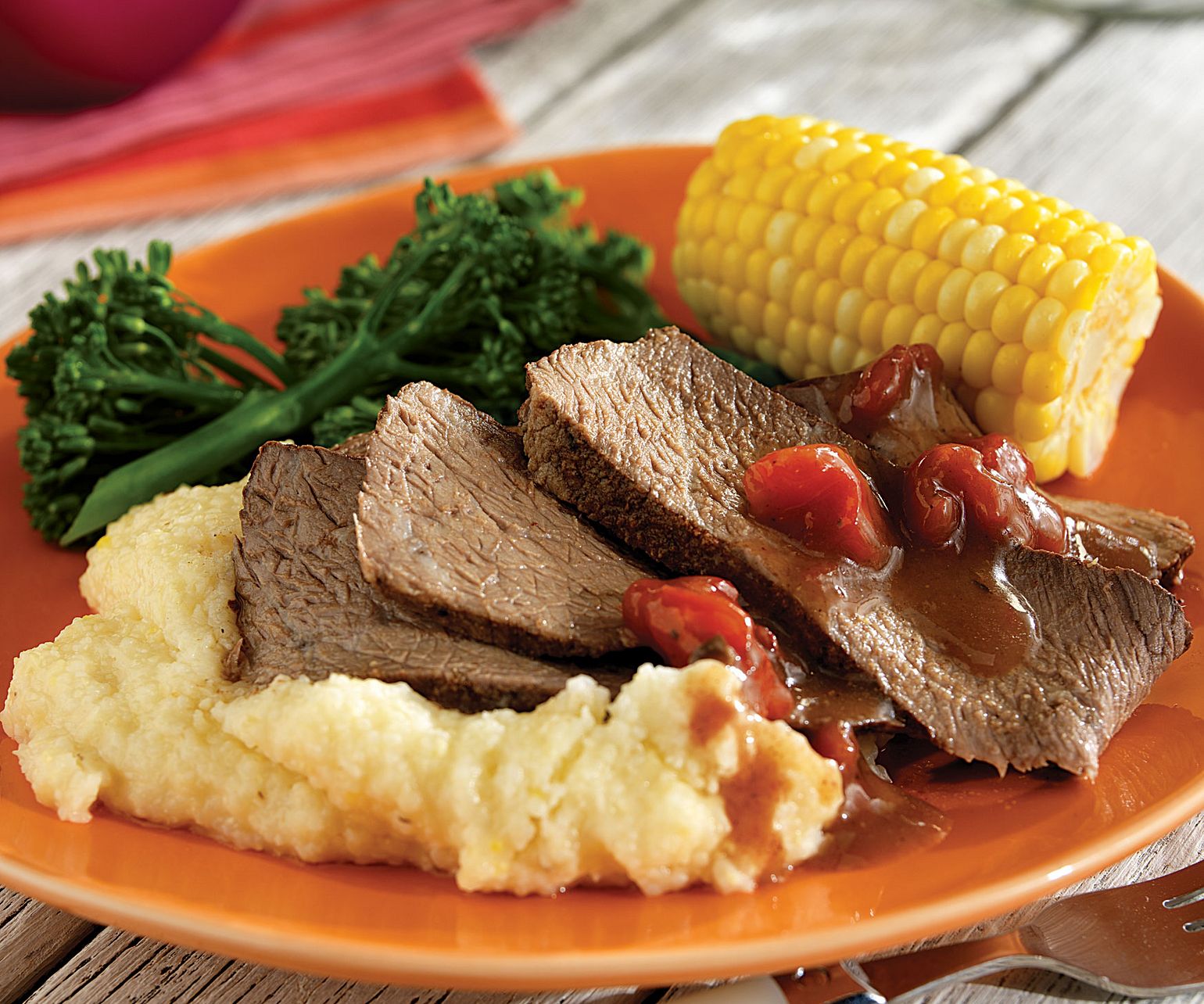 Grilled Cajun Chuck Roast with Spicy Cheddar Grits