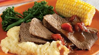 Grilled Cajun Chuck Roast with Spicy Cheddar Grits
