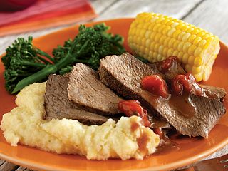 Grilled Cajun Chuck Roast with Spicy Cheddar Grits