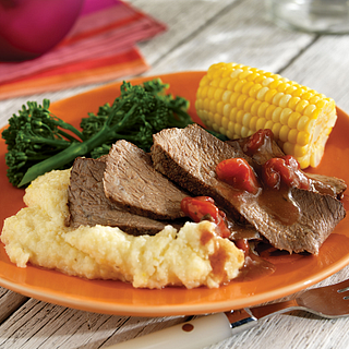 Grilled Cajun Chuck Roast with Spicy Cheddar Grits