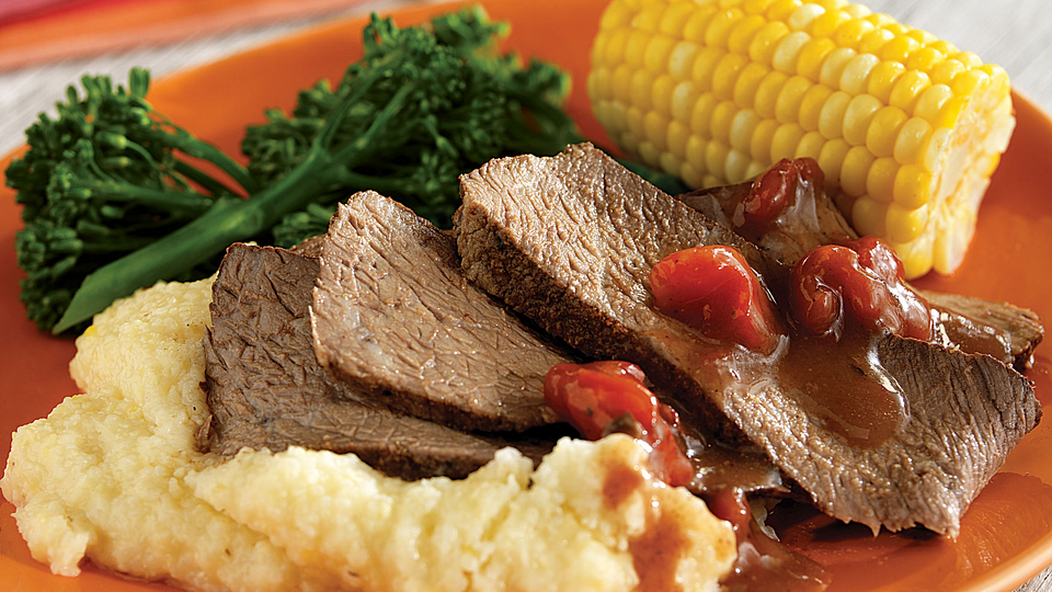 Grilled Cajun Chuck Roast with Spicy Cheddar Grits