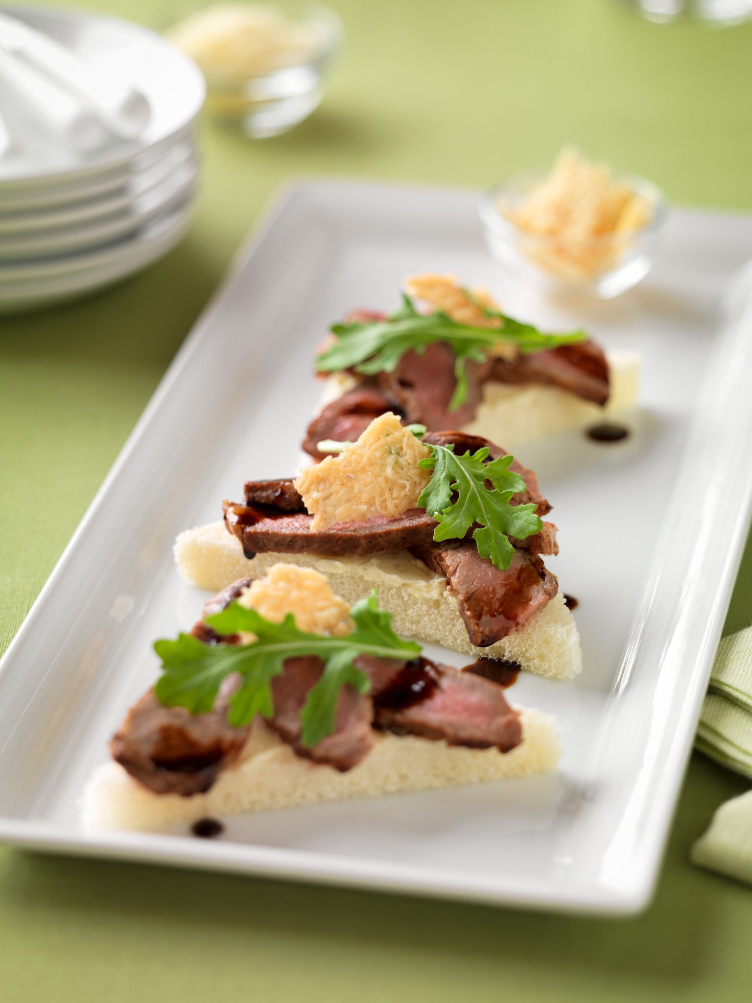 Beef Crostini with Parmesan Crisps and Balsamic Drizzle