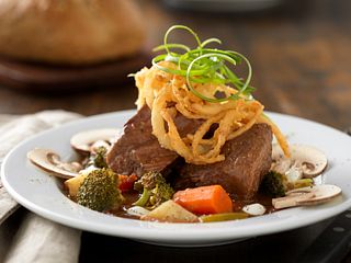 Slow-Cooked Beef Pot Roast Soup with Roasted Vegetables and Lemon Crema
