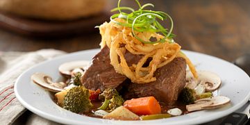 Slow Cooked Pot Roast Stew with Roasted Vegetables and Lemon Crema