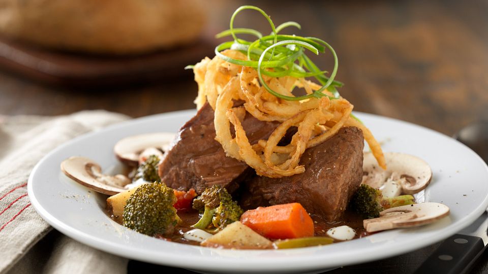 Slow Cooked Beef Pot Roast Soup with Roasted Vegetables and Lemon Crema