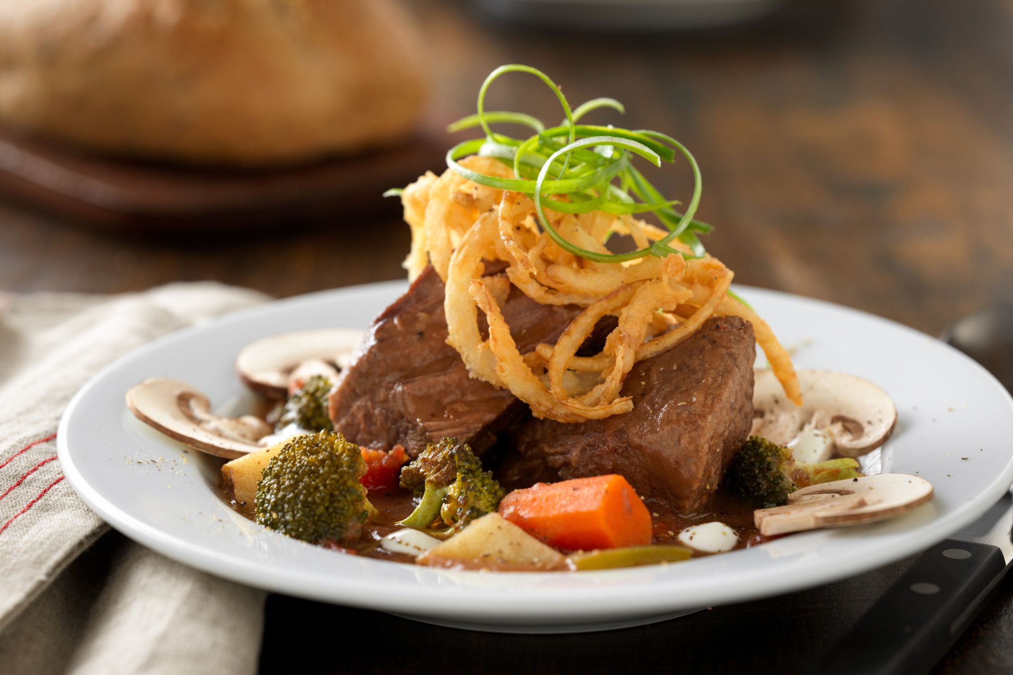 Slow-Cooked Beef Pot Roast Soup with Roasted Vegetables and Lemon Crema