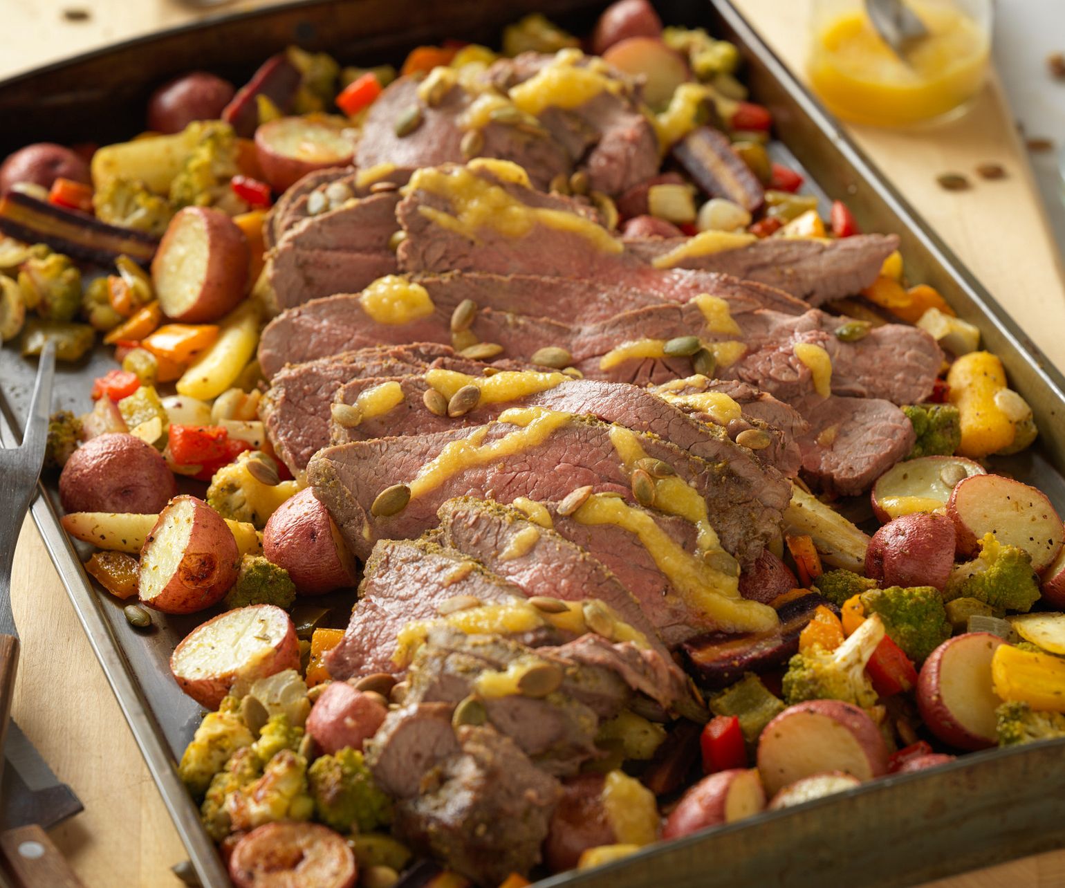Roasted Beef Tri-Tip with Rosemary Pesto Vegetables and Gin Apricot Sauce