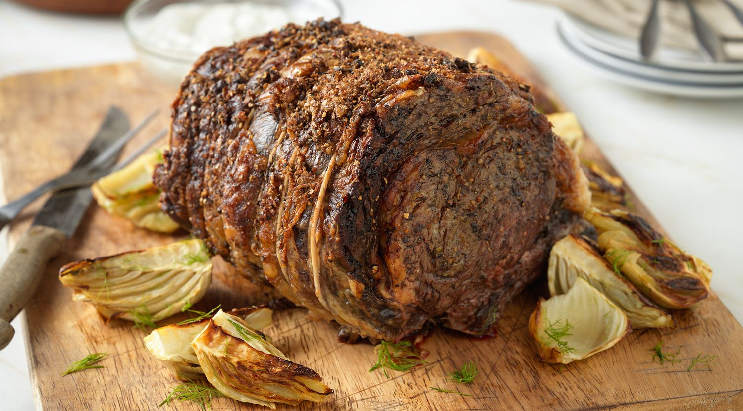 Herb-Crusted Beef Rib Roast with Roasted Fennel and Horseradish Cream Sauce