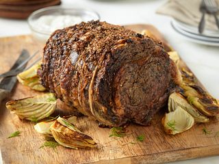 Herb-Crusted Beef Rib Roast with Roasted Fennel and Horseradish Cream Sauce