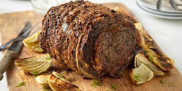 Herb-Crusted Beef Rib Roast with Roasted Fennel and Horseradish Cream Sauce