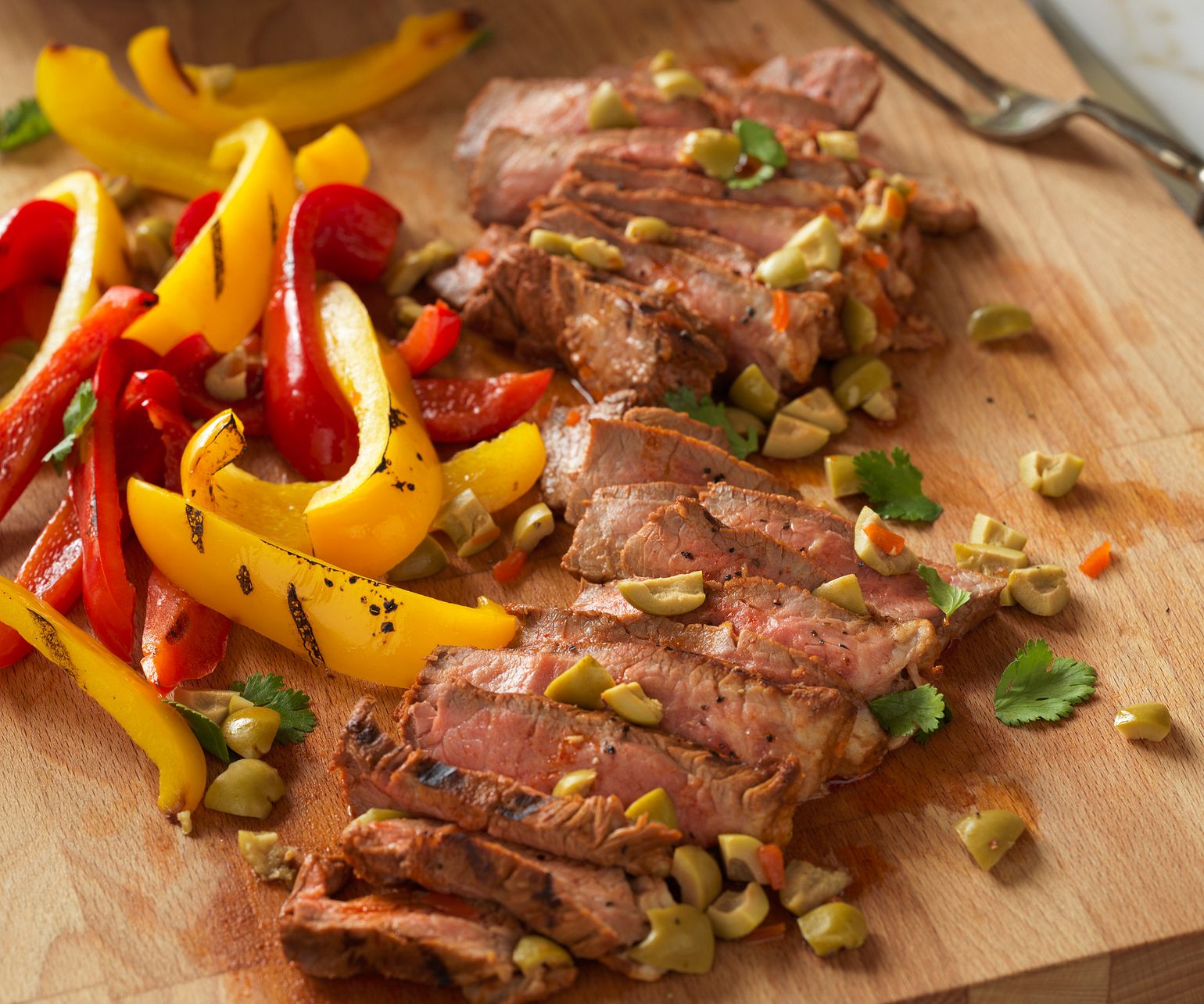 Spanish-Style Grilled Steaks with Olives