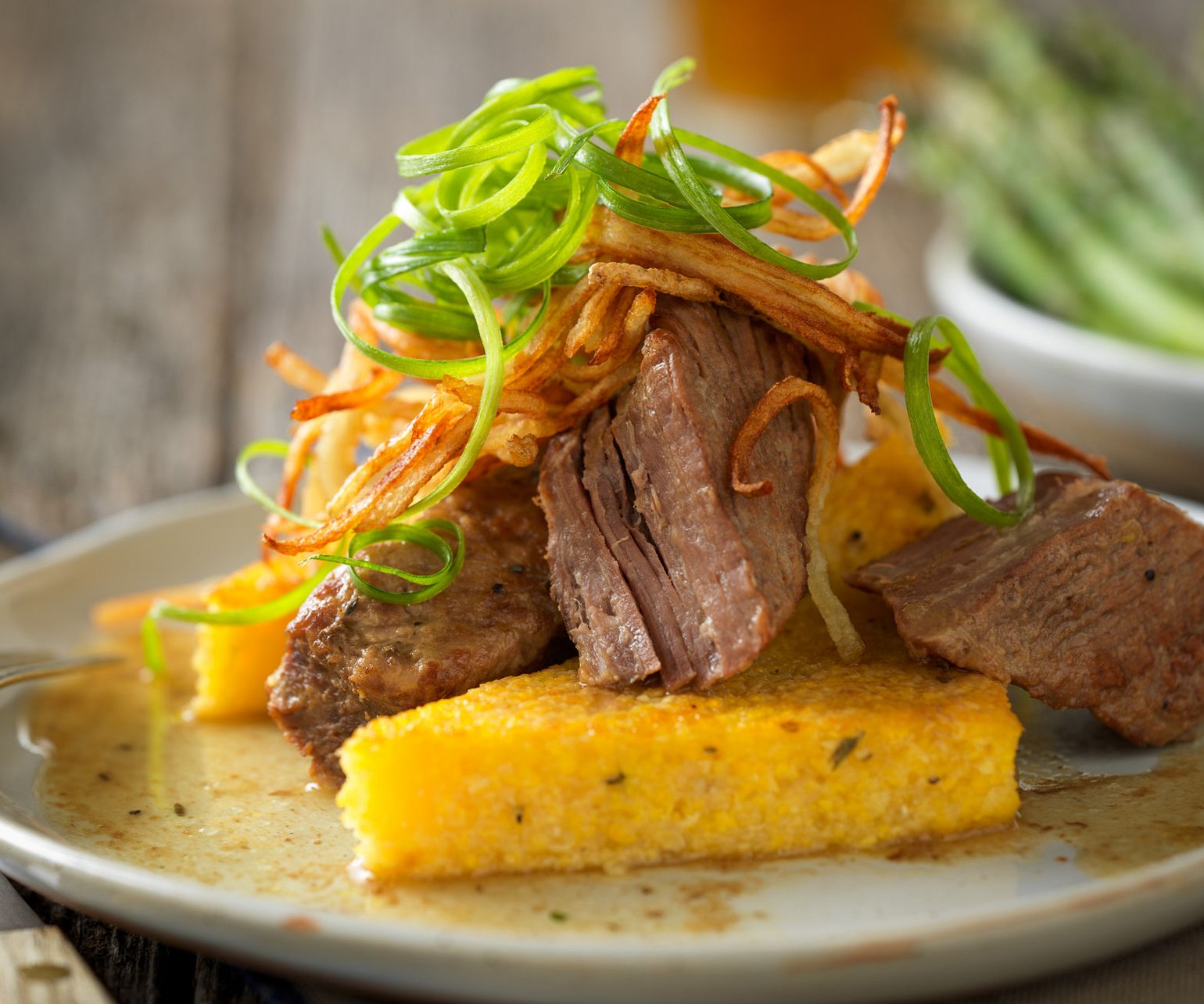 Slow-Cooked Red Wine Braised Beef Short Ribs with Herbed Polenta Toast